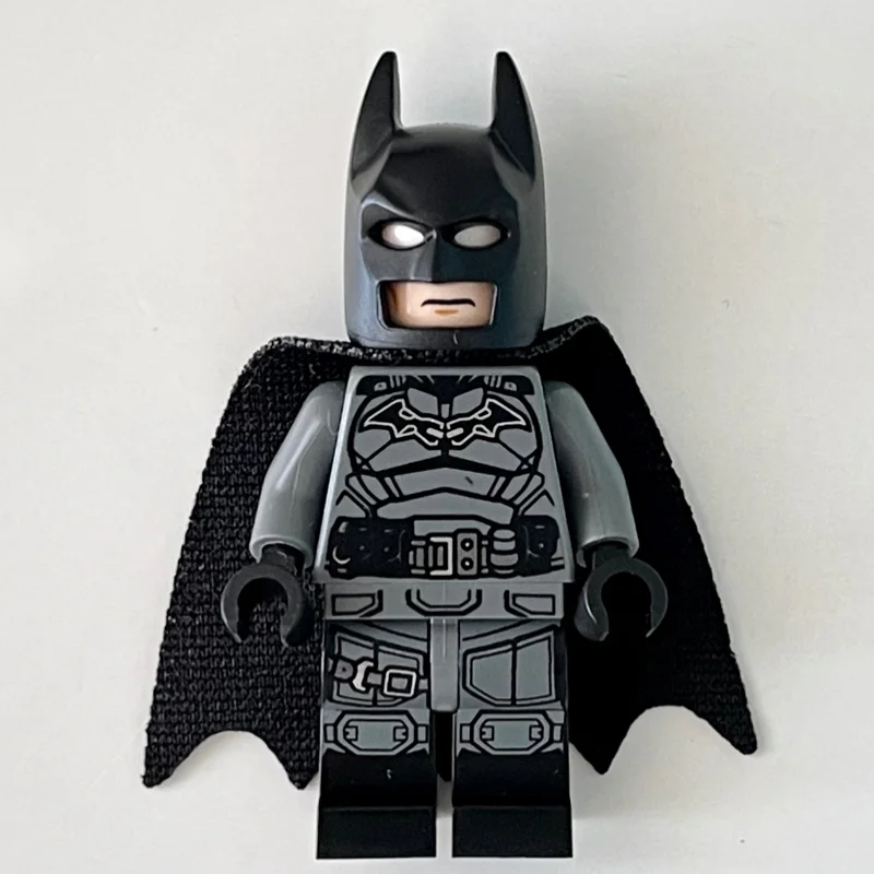 Batman, Dark Bluish Gray Suit, Black Cape and Cowl, Light Nougat Head, Dark Bluish Gray Hips, Black Legs
